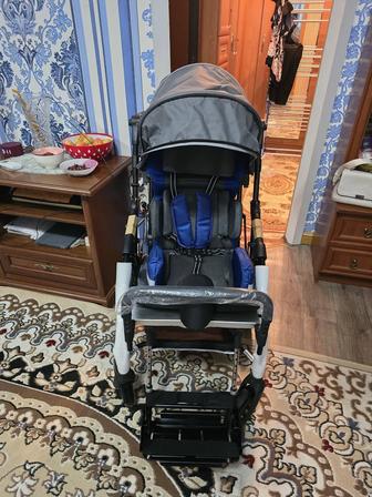 Продам спец коляску