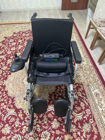 Электрическая инвалидная коляска