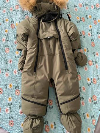 Продам зимний комбинезон на рост 68 см , новый!