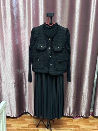 Женские платья и костюмы