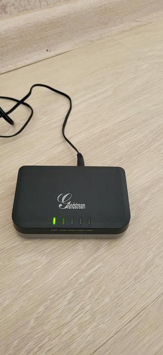 Продам голосовой IP адаптер Grandstream HT 704