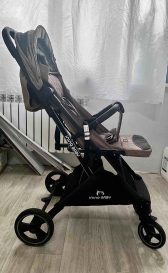 Продам коляску Ining Baby. дождевик, москитная сетка, подстаканник