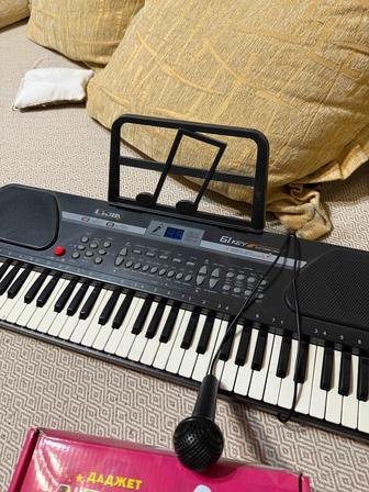 Игрушка синтезатор