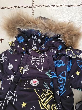 Продам новое зимние комбинезоны