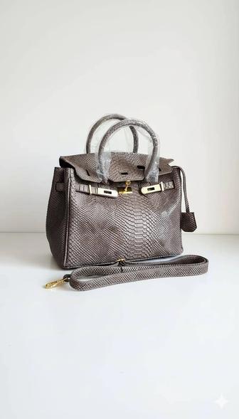 Продам новую кожаную сумку