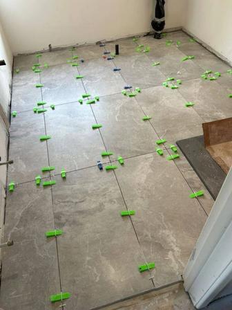 Укладка кафеля .