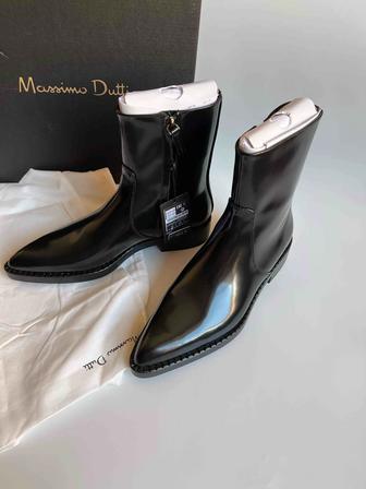 Продам новые сапоги Massimo dutti