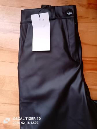 Брюки кожаные палаццо.