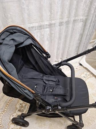 Коляска прогулочная перекидной ручкой
