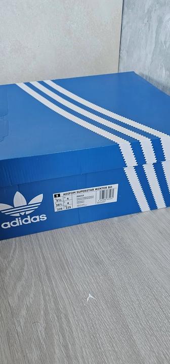Продам зимние дутики адидас