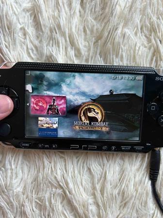 Продам портативную игровую приставку PSP