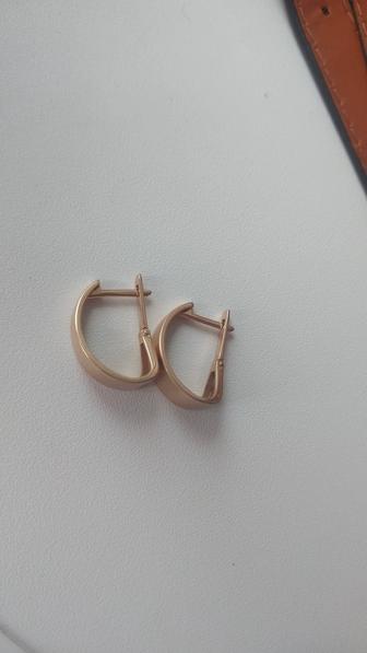 Продам золотые серьги