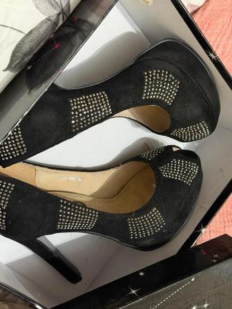 Продам новые туфли