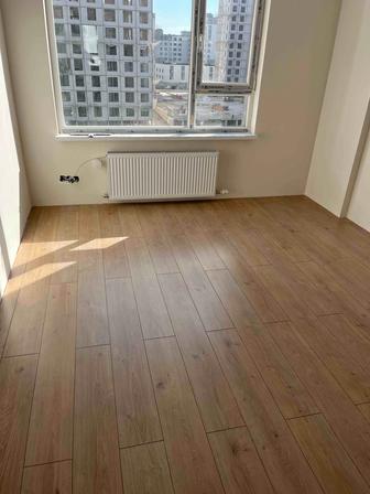 Укладка Ламината, монтаж плинтуса.