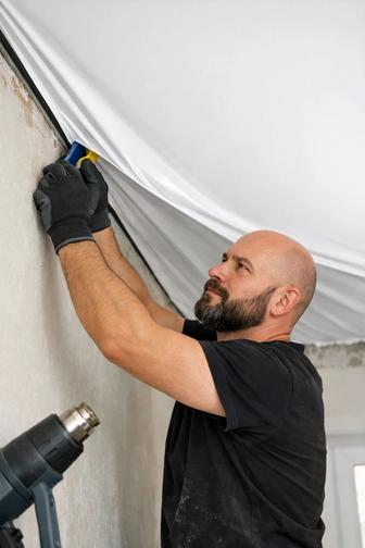 Установка натяжных потолков