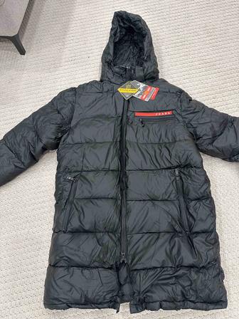 Продам пуховик новый 54 размер