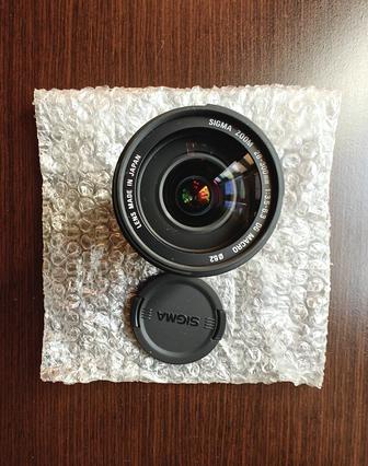 Фото объектив Sigma для Canon 28-300
