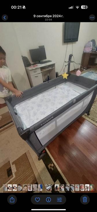 Продам детскую кроватку-манеж TOMIX