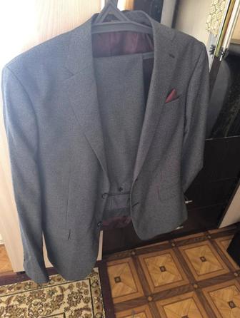 Продам мужской костюм. Цвет серый. Новый. Размер 46/56.