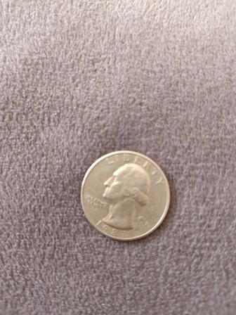 Продам монетуQuarter Dollar Liberty 1987 в хорошем состоянии.