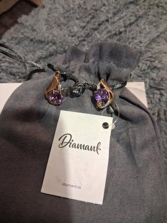 Продам золотые серьги