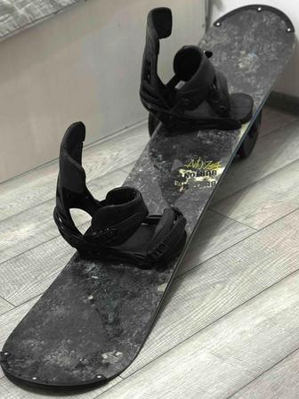 Продам сноуборд с креплениями в новом состоянии