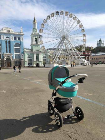 Коляска зеленая Adamex