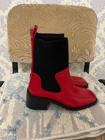 Продам сапоги новые