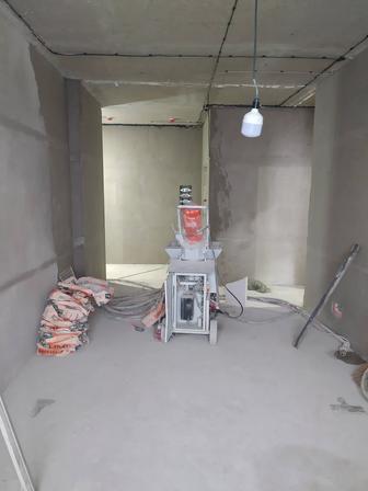 Штукатурка агрегатом под маяк