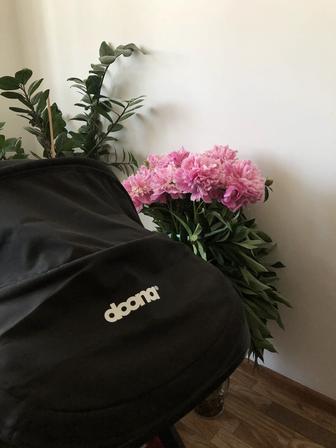 Продам автокресло-коляску DOONA