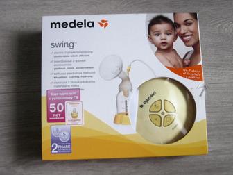 Продам электрический молокоотсос Medela