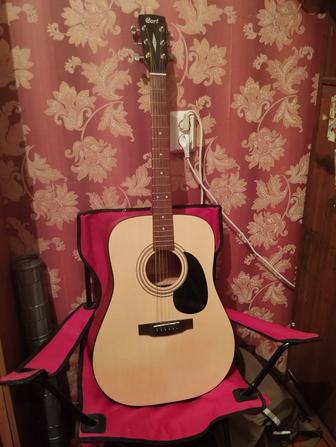 Акустическая новая гитара