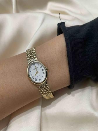 Золотые женские часы