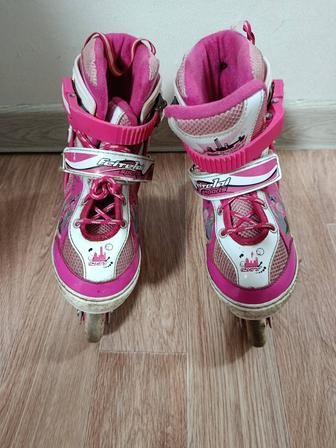 Роликовые коньки