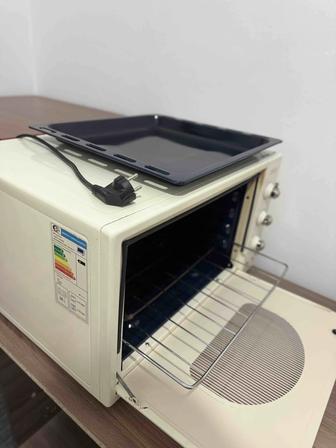 Продам духовку artel