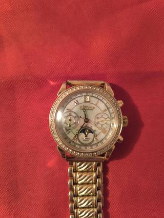 Продам золотые часы