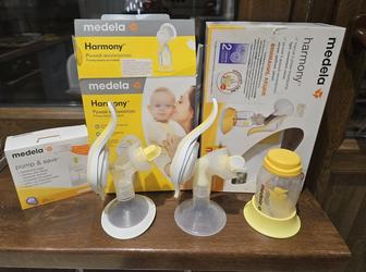 2 ручных молокоотсоса Medela