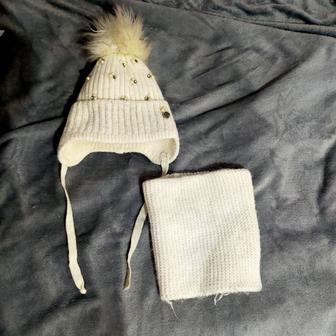 Продам теплую шапку