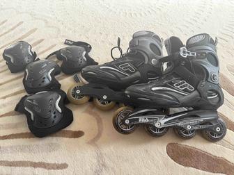 Роликовые коньки