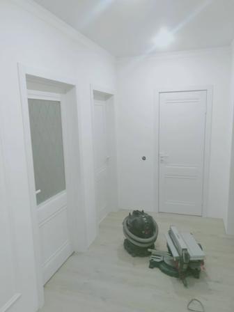 Установка дверей.Укладка ламината и плинтуса
