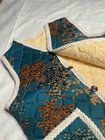 Теплая жилетка