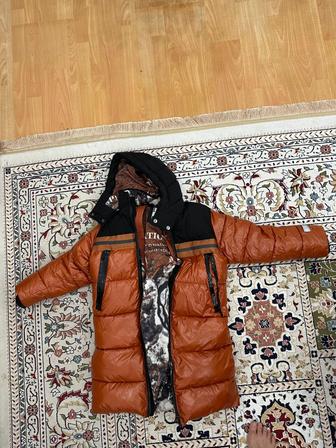 Продам зимнюю куртку для мальчика лет 8-12