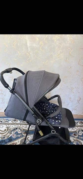 Коляска текнум