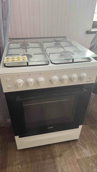 Продам газовую плиту с электрической духовкой