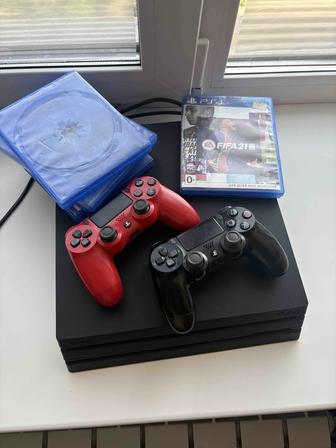 Продаю ps4 pro игровой приставка с дисками игры
