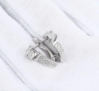 Продам серьги с бриллиантом