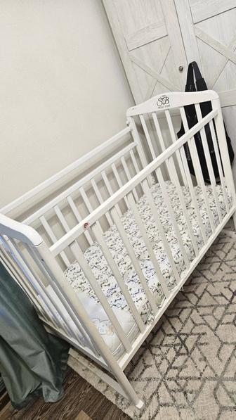 Продам кроватку с матрасом