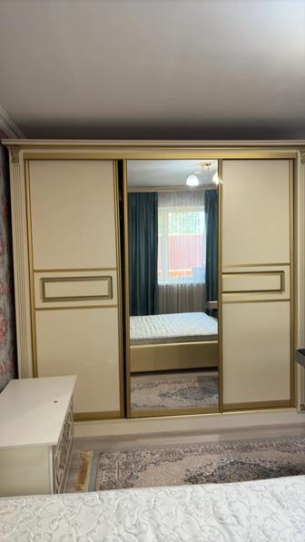 Шкаф для одежды и кровать