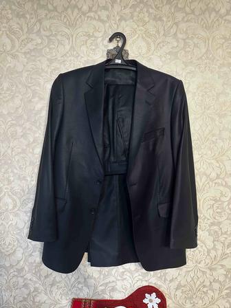 Новый костюм, черный(темно фиолетовый) ,46-50, 6-8ростовка