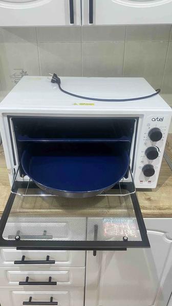 Продам электронную печь Артел